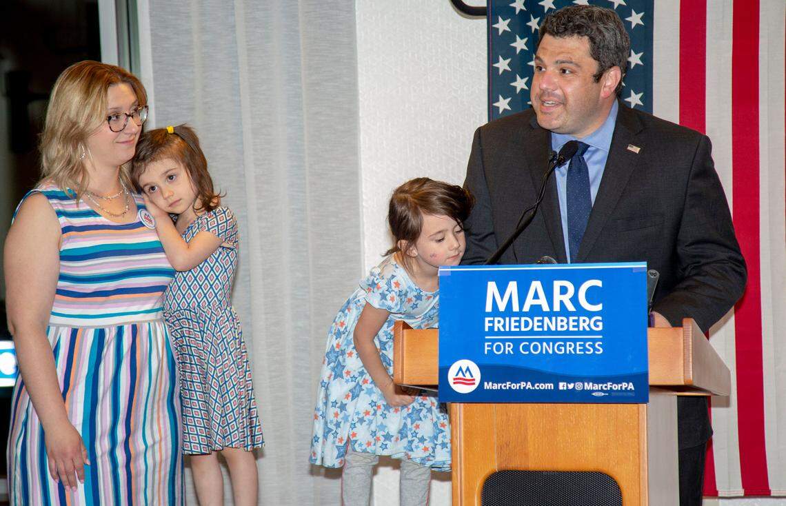 Surrounded by his family, Ferguson Township Democrat Marc Friedenberg addresses the crowd at his election night watch party Tuesday night at the Hyatt Place in State College shortly after the special election for the Pennsylvania 12th Congressional District was called for his opponent, Republican Fred Keller.