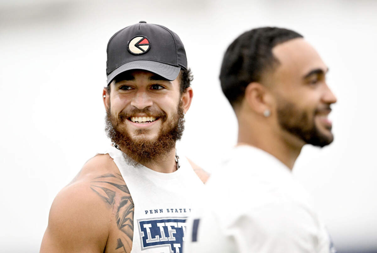 Penn State wide receiver Julian Fleming smiles during the 21st Annual Lift for Life to benefit Uplifting Athletes on Thursday, June 13, 2024 in Holuba Hall.