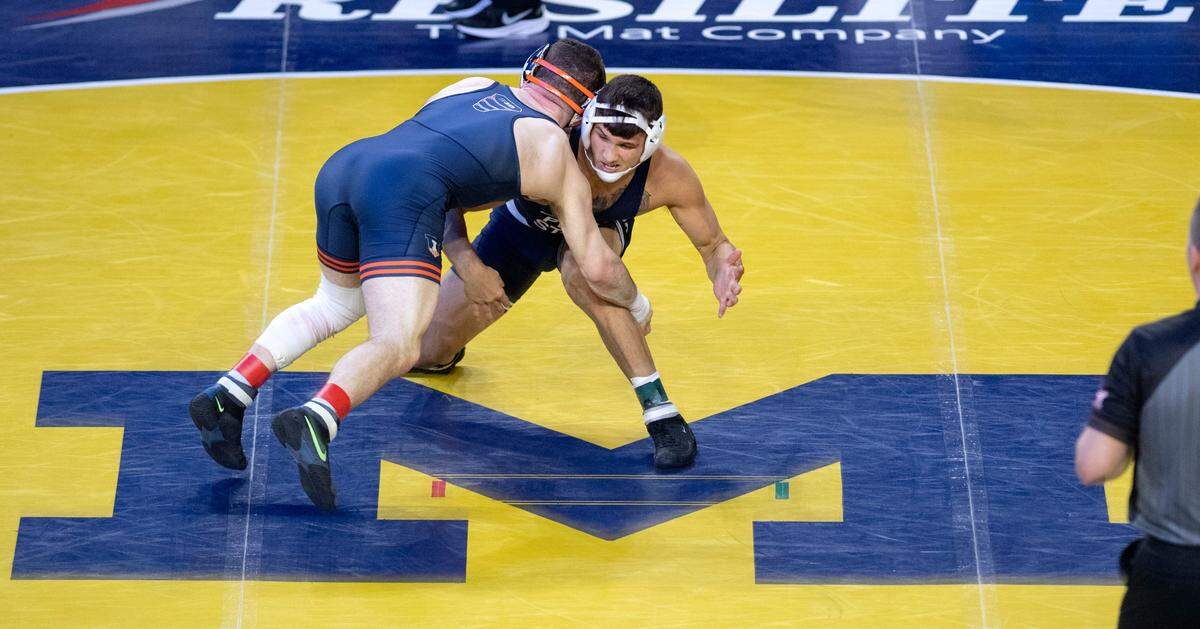 Penn State’s Alex Facundo wrestles Illinois’ Dan Braunagel in the165 lb bout for seventh place at the Big Ten wrestling championships at the Crisler Center on Sunday, March 5, 2023.