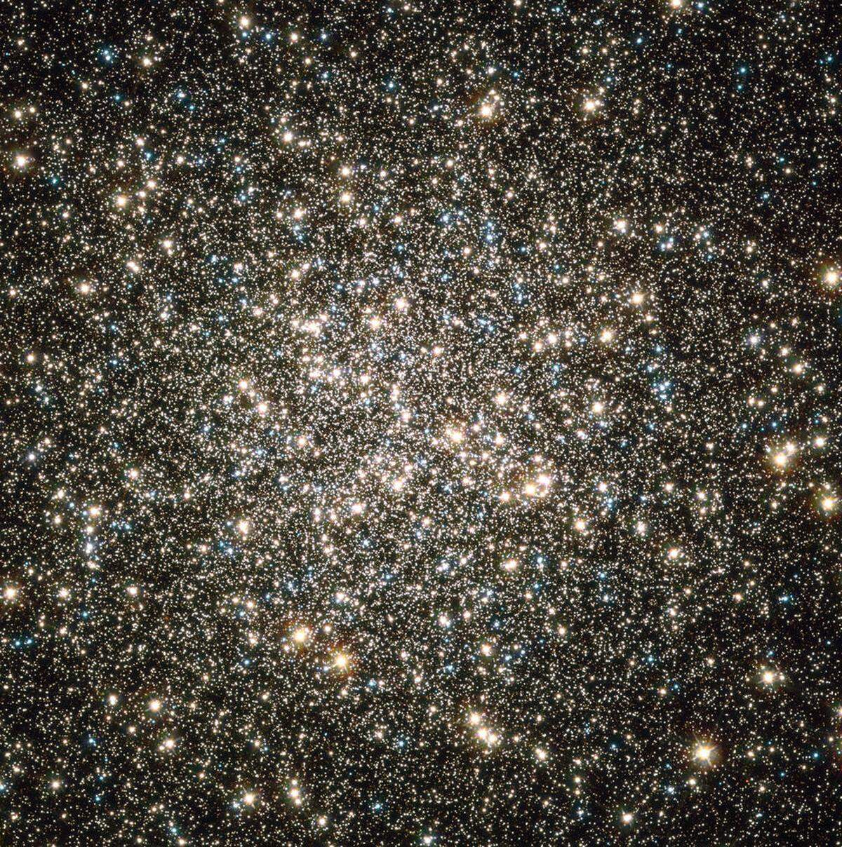 See Messier 13, or the Hercules Cluster, in the night sky this June and July. More than 100,000 stars circle in this globular cluster, and you may want to use a telescope to get the best view.