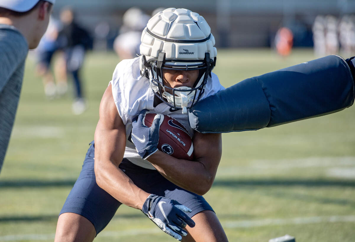 Penn State wide receiver Mitchell Tinsley runs a drill during the first day of spring practice on Monday, March 21, 2022.