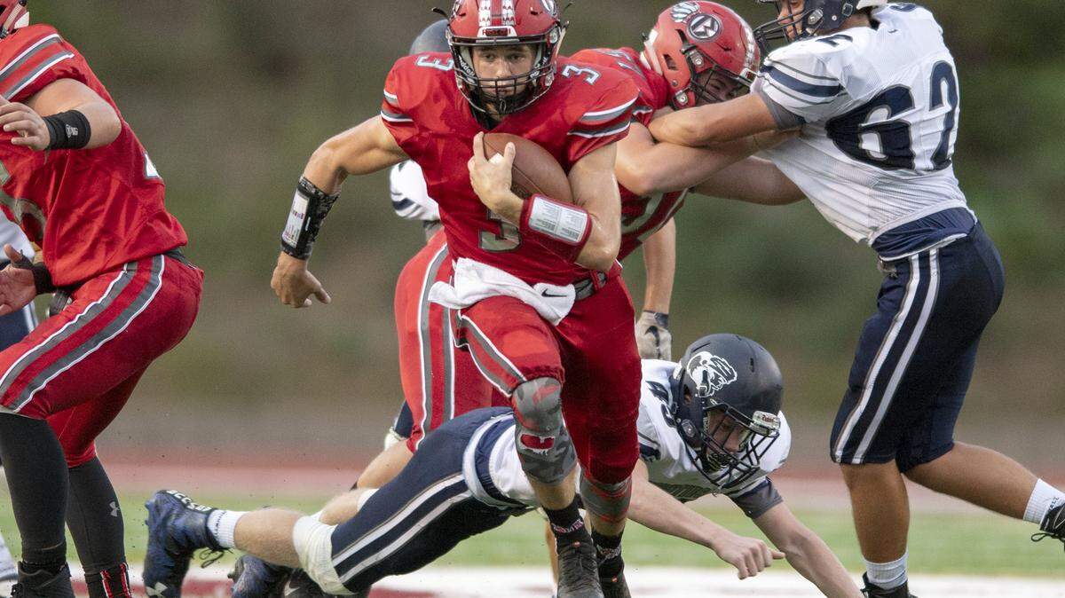 A Philipsburg-Osceola defender misses Bellefonte’s quarterback Kyle Myers during a game on Friday, Sept. 7, 2018 at the Lock Haven University.