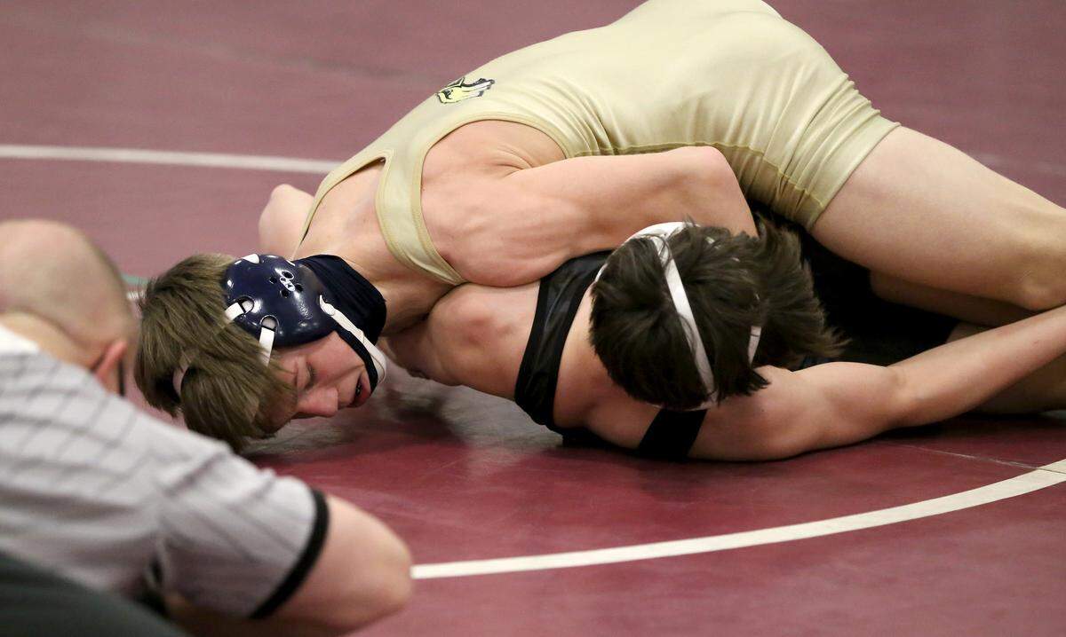 Bald Eagle Area’s Coen Bainey controls Penn Cambria’s Trent Hoover in the 113 lb championship bout at the District 6 AA wrestling on Saturday, Feb. 20, 2021.