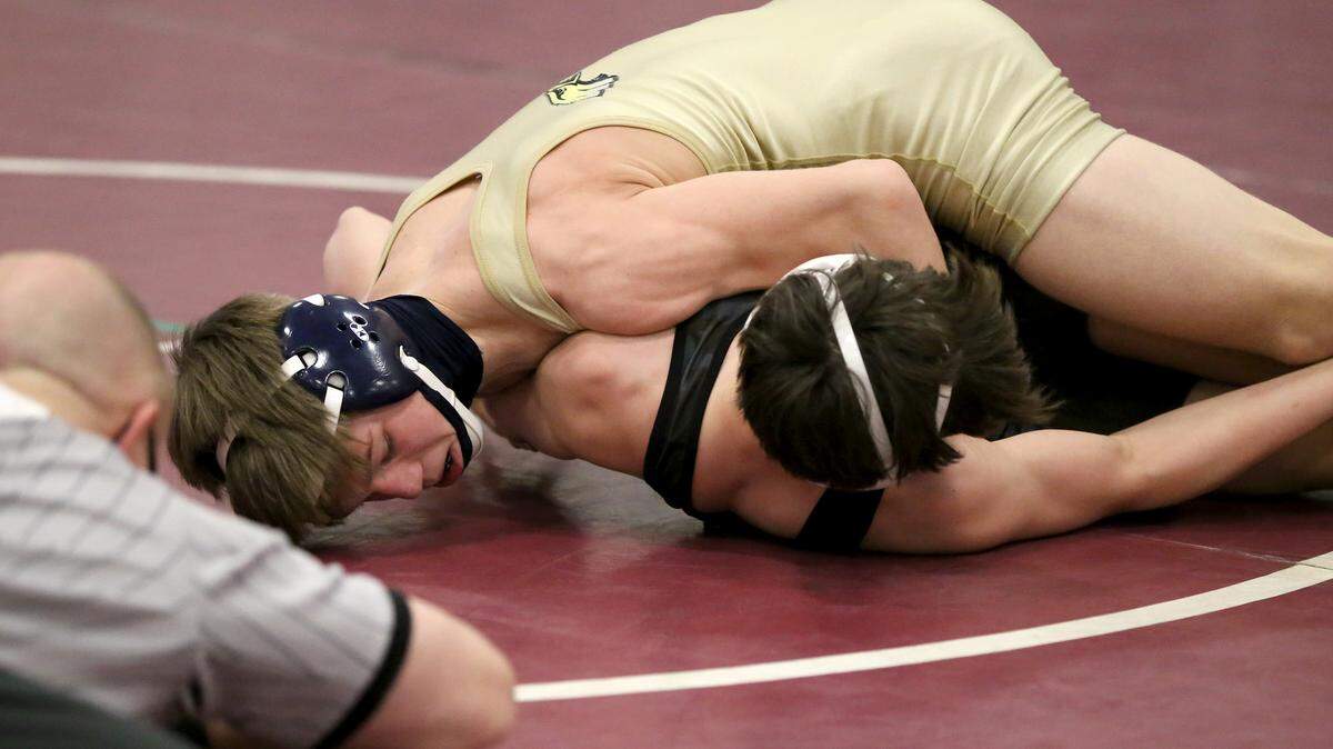 Bald Eagle Area’s Coen Bainey controls Penn Cambria’s Trent Hoover in the 113-pound championship bout at the District 6 AA wrestling on Saturday, Feb. 20, 2021.