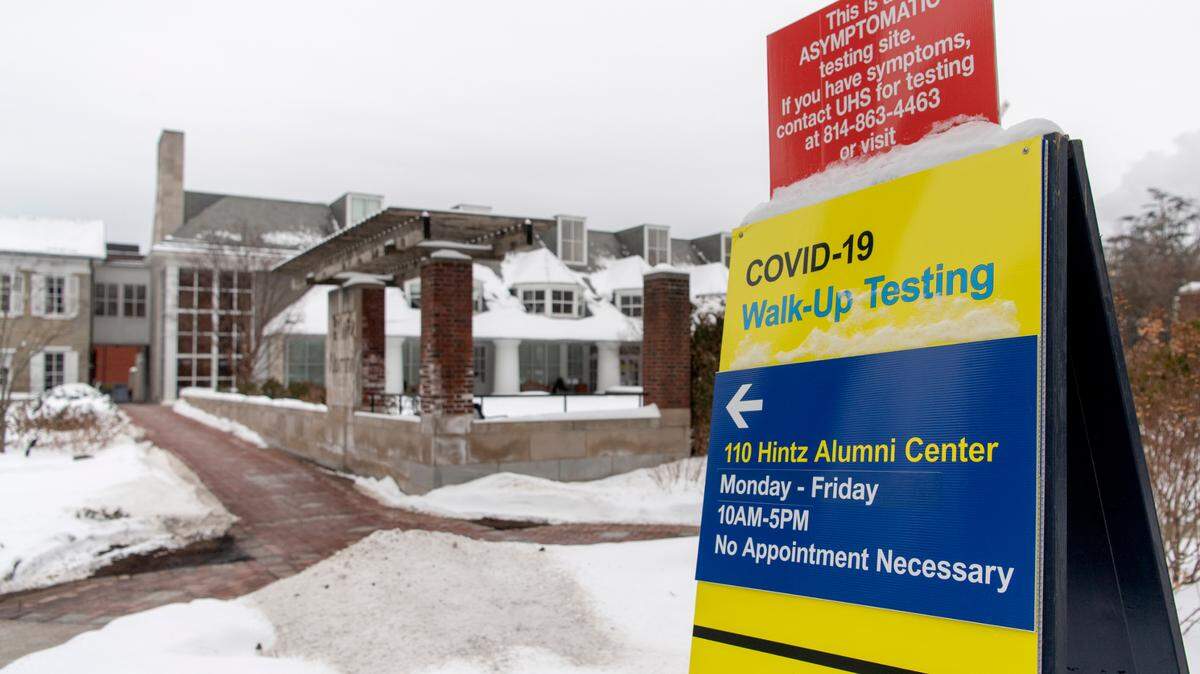 Signs for the walk-up COVID 19 testing site for Penn State students and employees at the Hintz Alumni Center on Friday, Feb. 12, 2021.