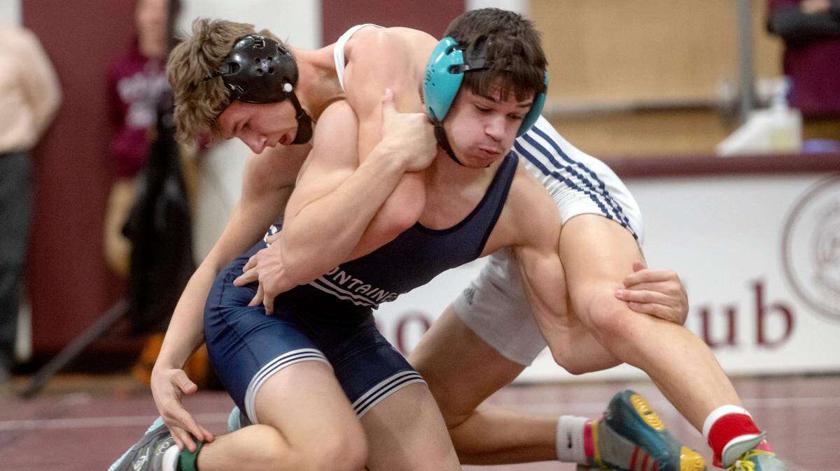 Philipsburg-Osceola’s Marcus Gable wrestles Penns Valley’s Ty Watson in the 152 lb championship bout of the District 6 2A championships on Saturday, Feb. 18, 2023.