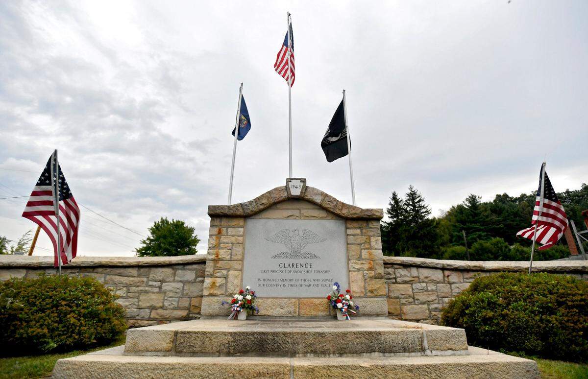 American flags blow in the breeze at a memorial in Clarence in 2016.