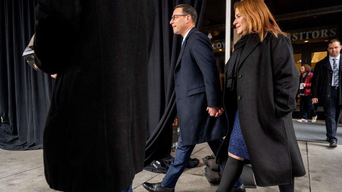 Josh Shapiro, who has hired close allies to advise him as governor, leaves the Capitol with his wife Lori before being sworn in.