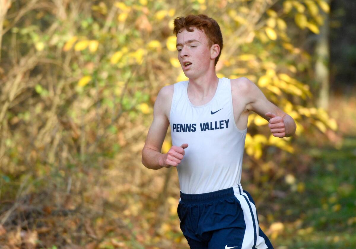 Penns ValleyÕs Thaddaeus Smith comes down one of the hills in the Mountain League cross country championship race at Penns Valley on Wednesday, Oct. 21, 2020. Smith finished in second with a time of 17:15.