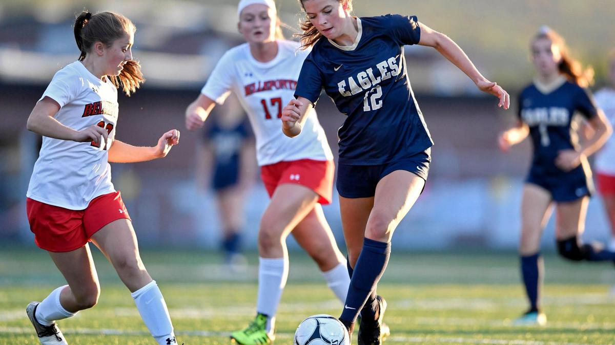 Bald Eagle Area’s Falen McHenry dribbles down the field with the ball around a Bellefonte defender during the game on Thursday, Oct. 1, 2020. McHenry scored the first goal of the game on the drive.