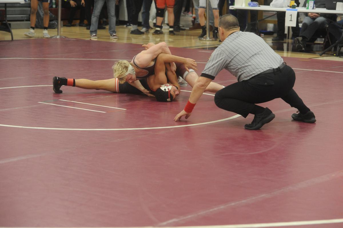 State College’s Pierson Manville turns Meadville’s Jacoby Thompson in their 139-pound quarterfinals match of the PIAA Class 3A Northwest Regional Championships on Friday, Feb. 24, 2023 in Altoona. Manville pinned Thompson in 44 seconds.