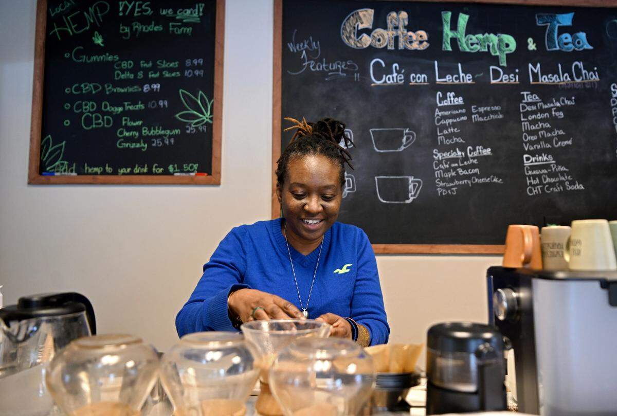 Nia Rodriguez makes a drink at Coffee, Hemp and Tea on Saturday, Jan. 20, 2024.