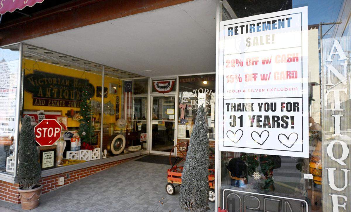 A sign outside of Victorian House Antiques in Bellefonte announces their retirement sale on Thursday, Jan. 9, 2025.