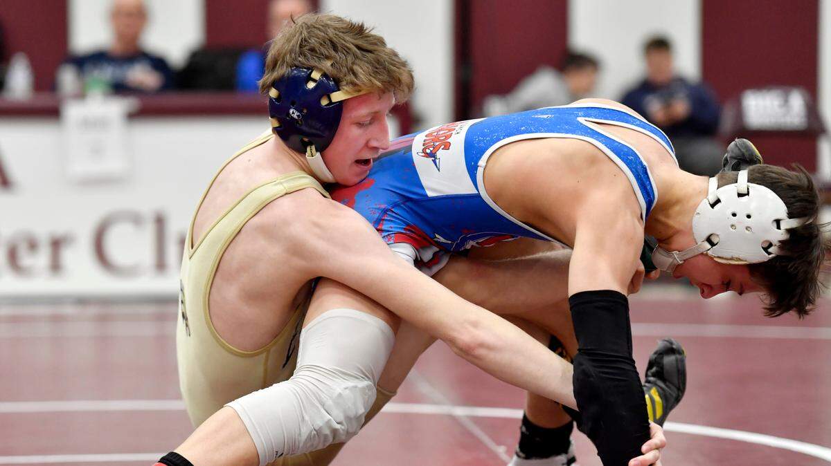 Bald Eagle Area’s Lucas Fye wrestles West Branch’s Landon Bainey in the 113 pound championship bout of the District 6 2A tournament on Feb. 19. Bainey won by decision 7-5.