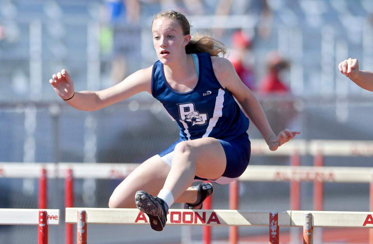 Philipsburg-Osceola’s Samantha Bainey competes in the 100 meter hurdles prelims during the District 6 AA Track and Field Championships on Tuesday, May 15, 2018 at Mansion Park in Altoona.
