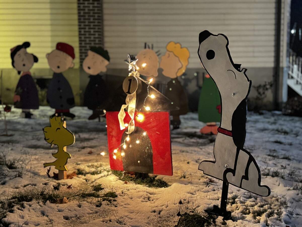 Snoopy and the Peanuts sing at 177 Arbor Bluff Drive, Pleasant Gap, on Dec. 4, 2025.