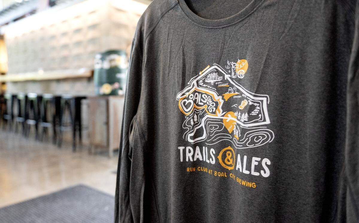 A shirt features the Trails & Ales Run Club at Boal City Brewing on Thursday, Aug. 14, 2025.  
