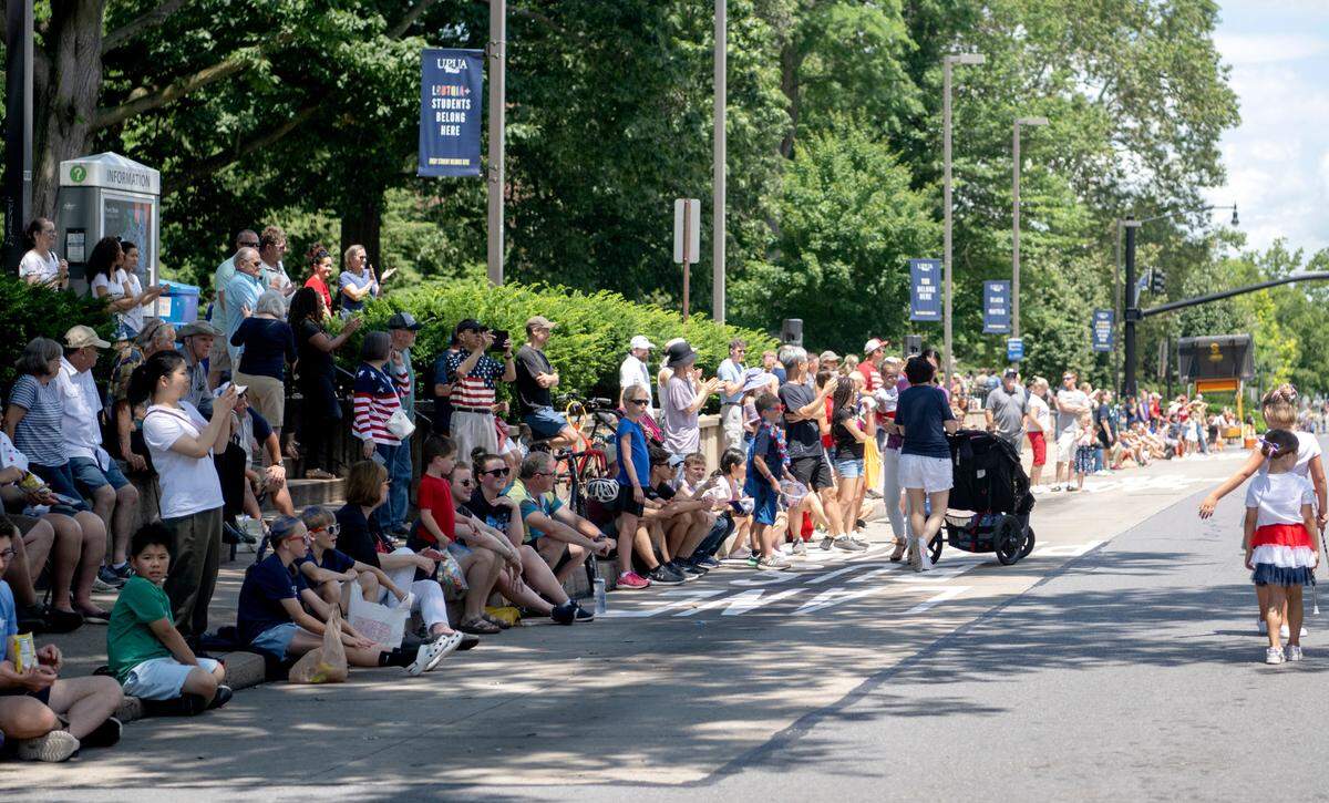 The community lines College Avenue for the Central PA 4th Fest Parade on Tuesday, July 4, 2023.