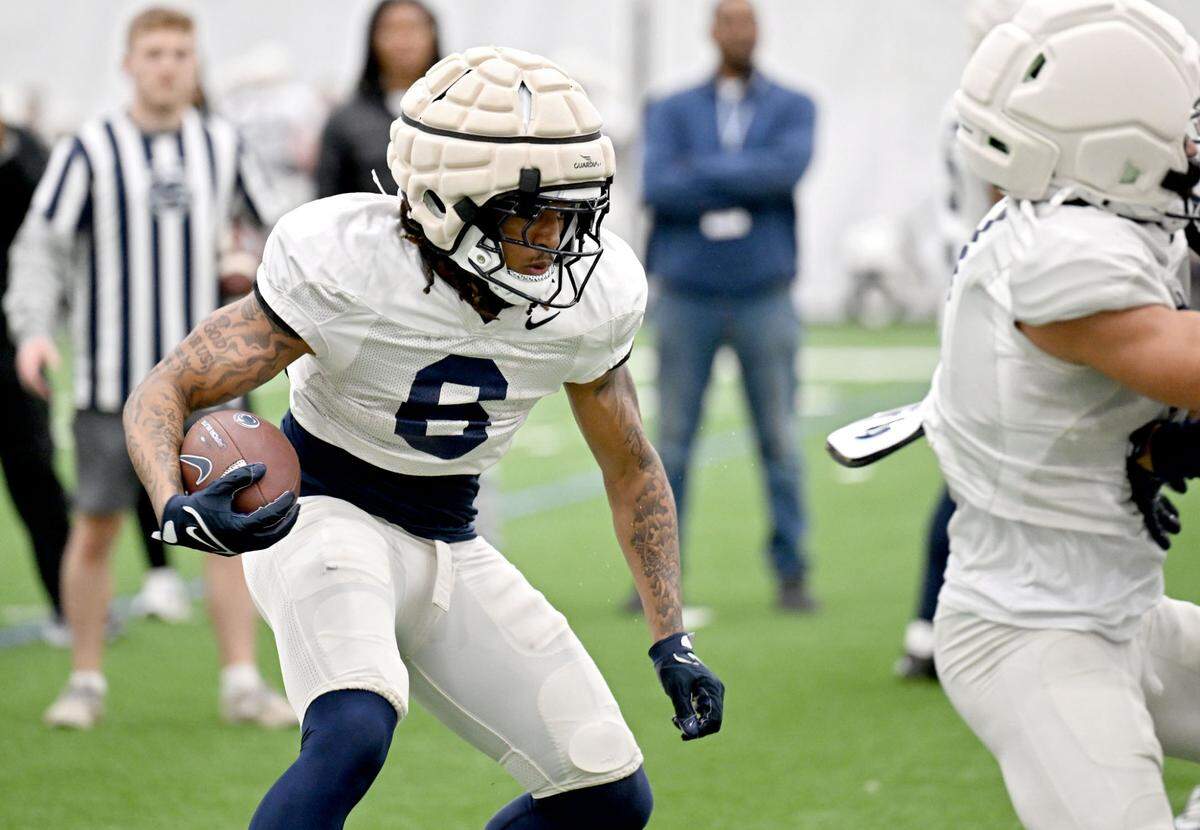 Penn State wide receiver Matt Outten runs with the ball during spring football practice on Tuesday, April 1, 2025.