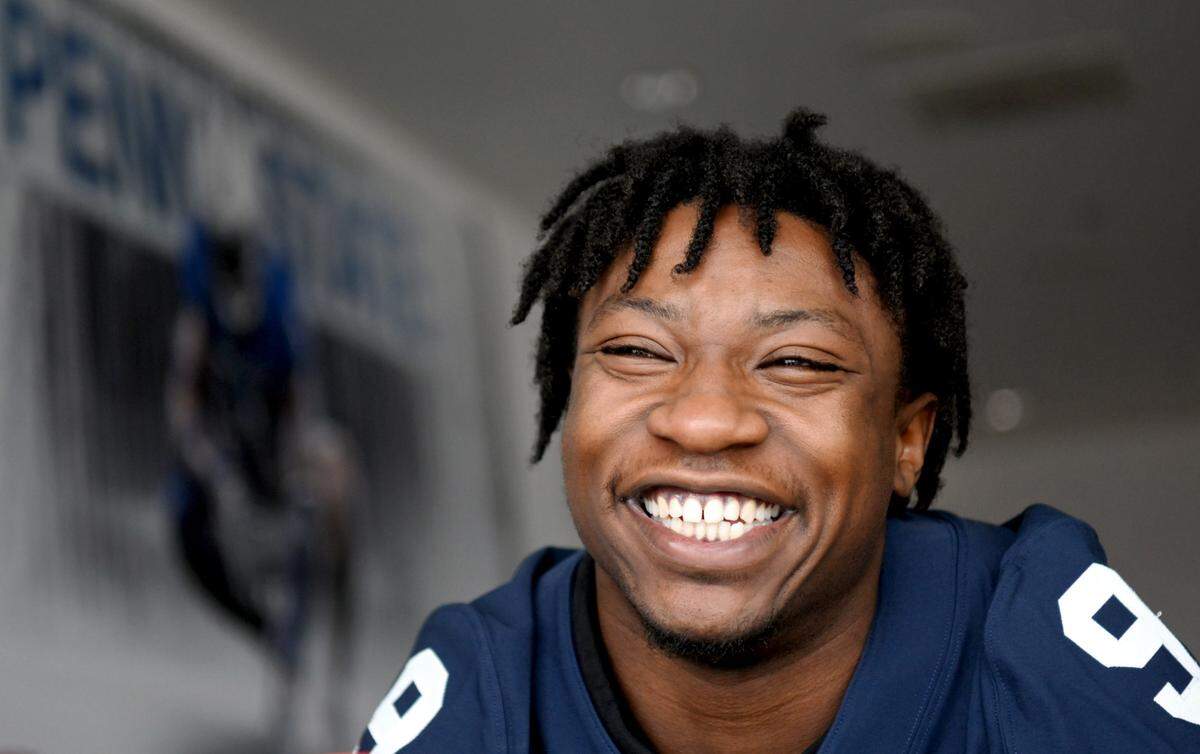 Penn State safety King Mack laughs as he answers a question on Tuesday, Feb. 13, 2024.