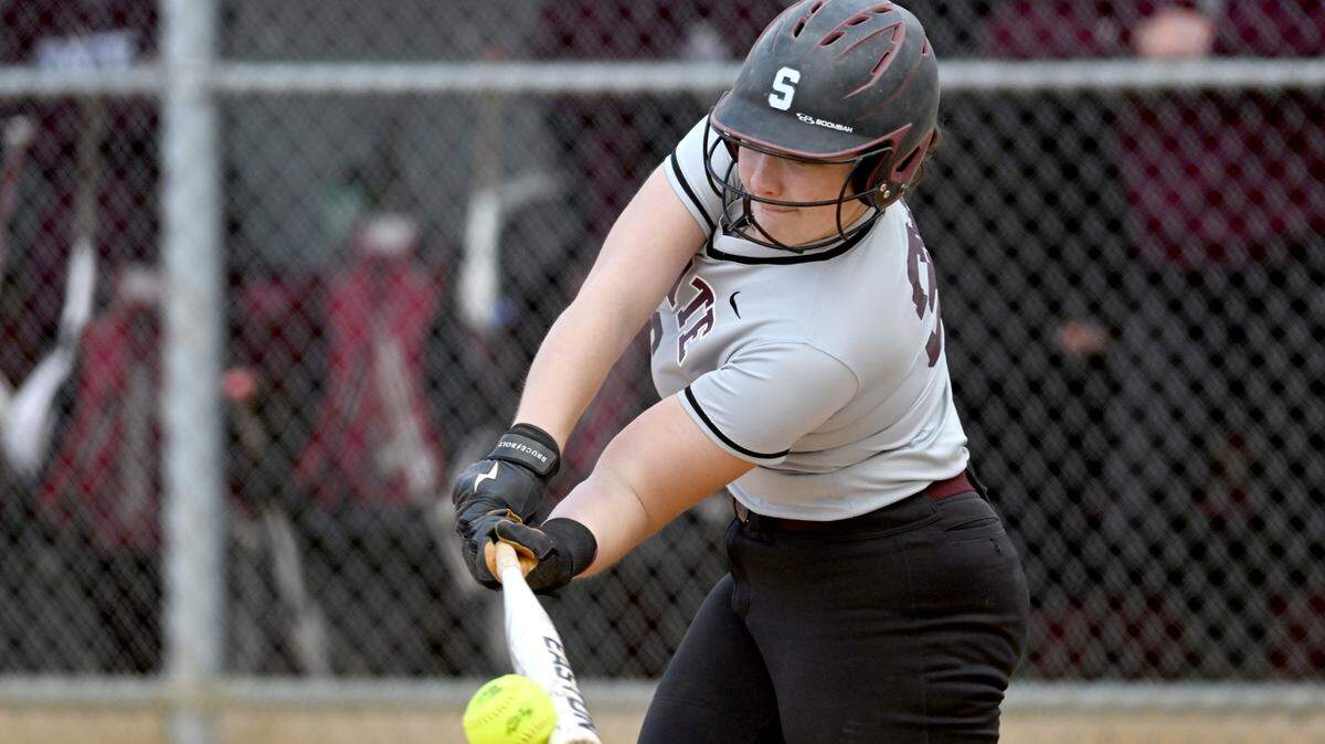 State College’s Ava Babcock gets a hit that scores a run during the second inning of the game against Mifflin County on Monday, April 24, 2023.