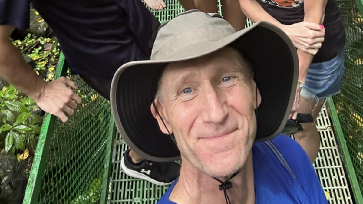 The writer in front with two of his sons (Alex to left, Aidan in back); wife Denise on right, and Alex’s girlfriend, Courtney, in middle). This picture was taken in middle of rainforest hike in Costa Rica in April, with Alex serving as Spanish translator.