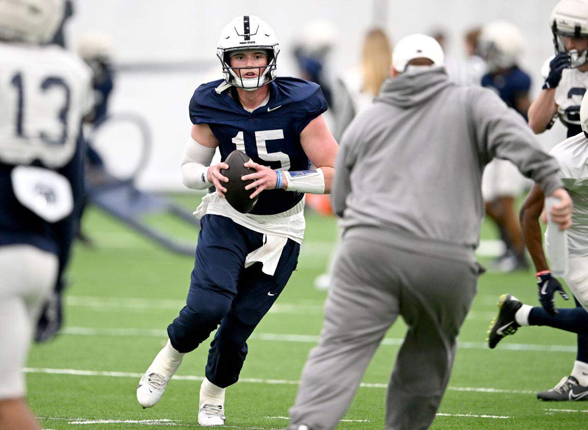 Penn State quarterback Drew Allar runs a drill during spring football practice on Tuesday, April 1, 2025.