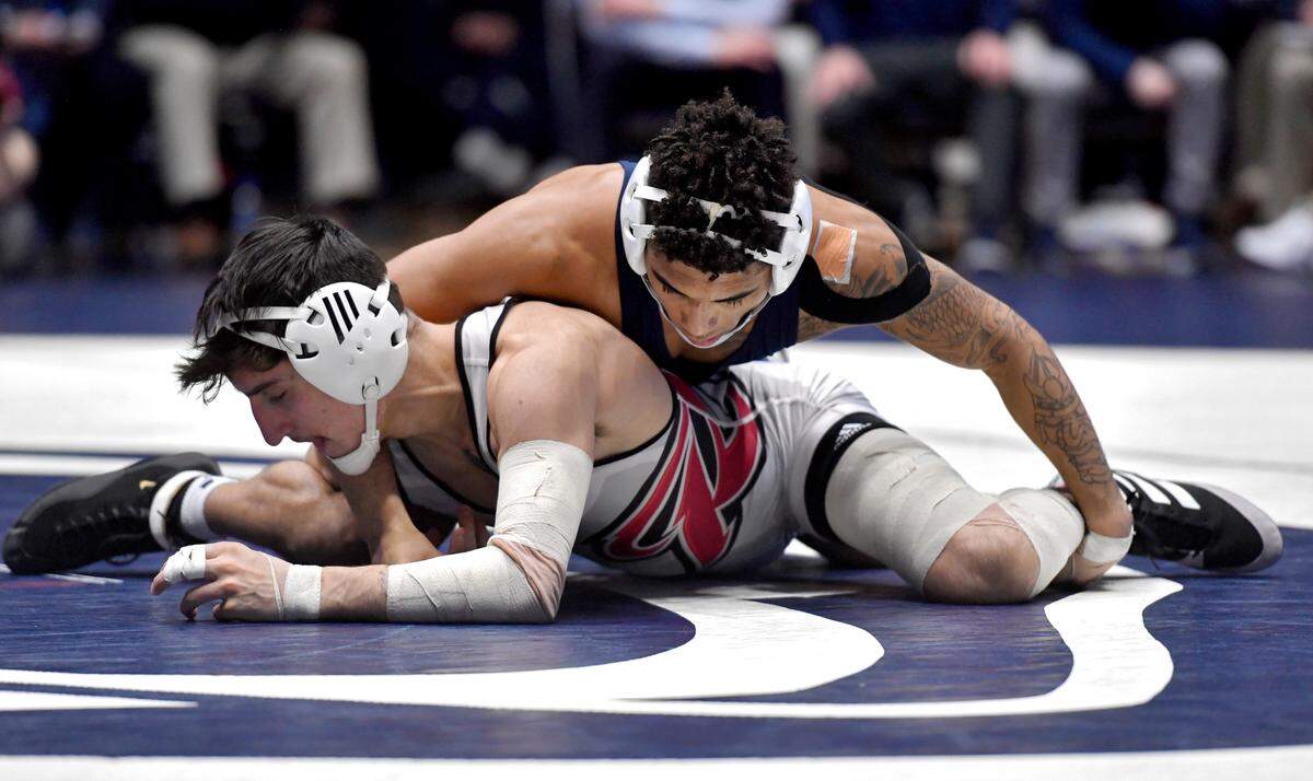 Penn State’s Roman Bravo-Young controls Rider’s Richie Koehler in the 133 lb bout of the match on Sunday, Feb. 20, 2022.