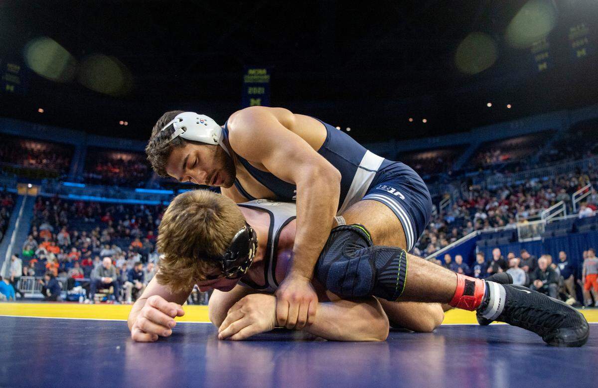 Penn State’s Shayne Van Ness controls Purdue’s Jaden Reynolds in a 149 bout of the Big Ten wrestling championships at the Crisler Center on Saturday, March 4, 2023.