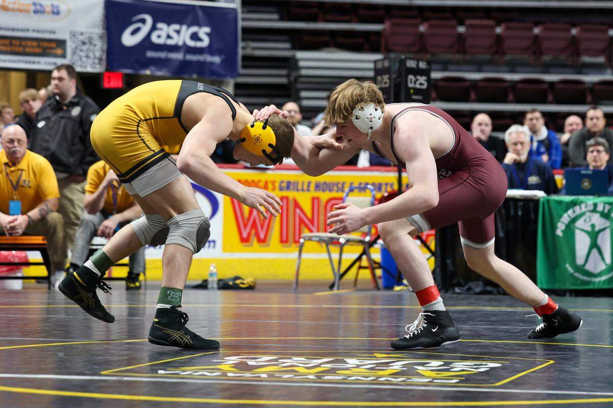 Thomas Jefferson’s Bode Marlow and State College’s Asher Cunningham face-off in the 160-pound PIAA Class 3A semifinal match on Friday, March 8, 2024 at the Giant Center in Hershey.