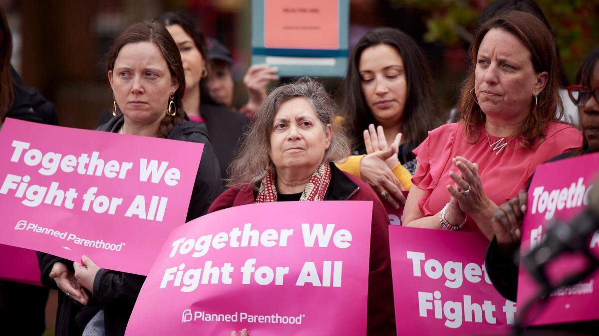 Public officials and members of Planned Parenthood at a 2022 press conference about the overturning of Roe v. Wade.