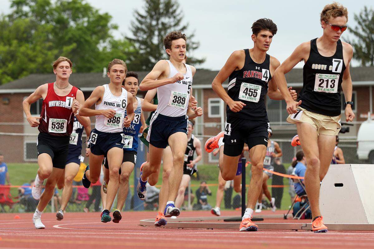 Penns Valley’s Colton Sands, center, and Brendan Colwell, left, compete in the boys Class 2A Class 2A 1600 meter run finals during the PIAA State Track and Field Championships held Friday at Seth Grove Stadium on the Shippensburg University campus in Shippensburg, PA.Matthew O’Haren/For the Centre Daily Times