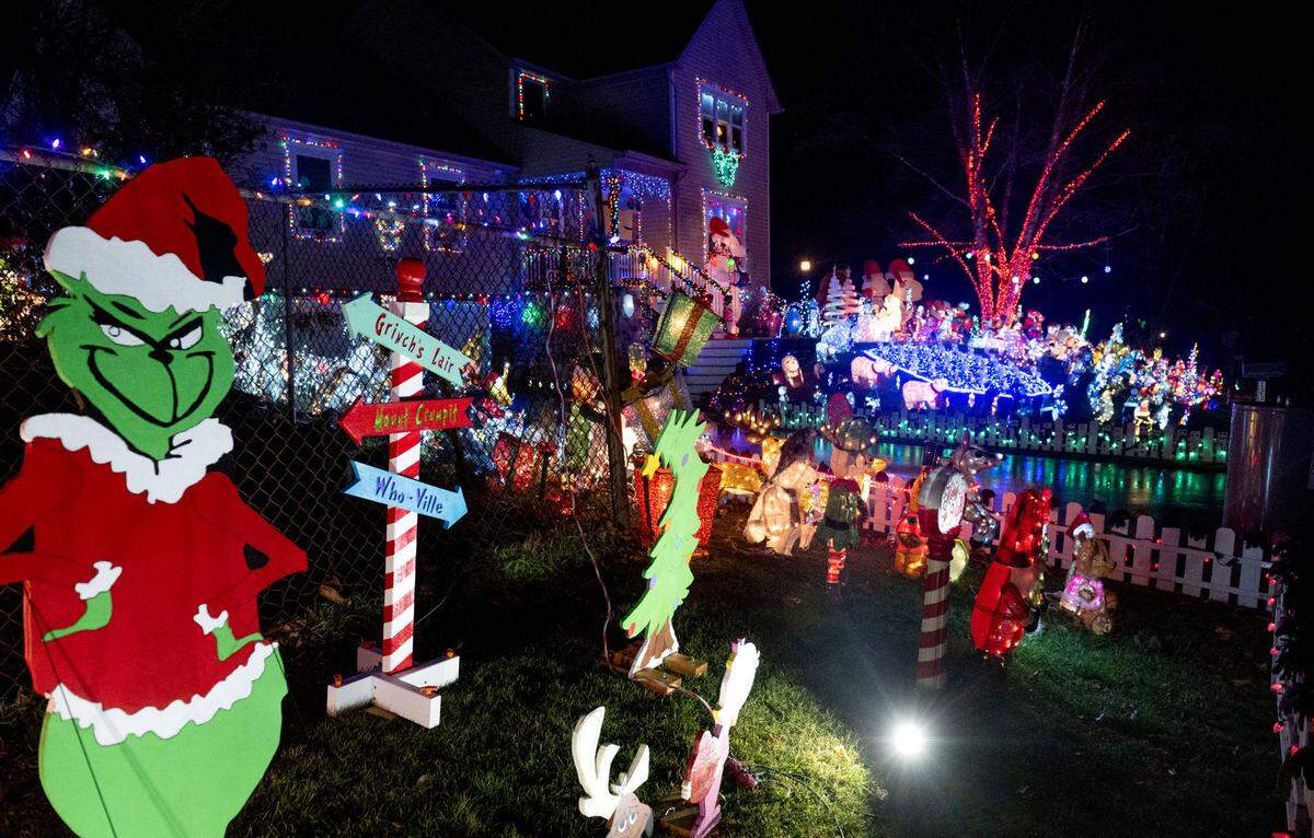 Christmas decorations fill the front yard at 1231 Shamrock Ave. in State College Dec. 10, 2024. Viewers can tune into FM 105.3 to listen to music while they enjoy the display.