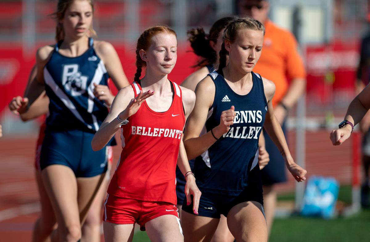 Bellefonte’s Ashleigh Aukerman and Penns Valley’s Alexis Durn at the start of the 1600 meter run during the Mountain League Track and Field championships on Tuesday, May 10, 2022.