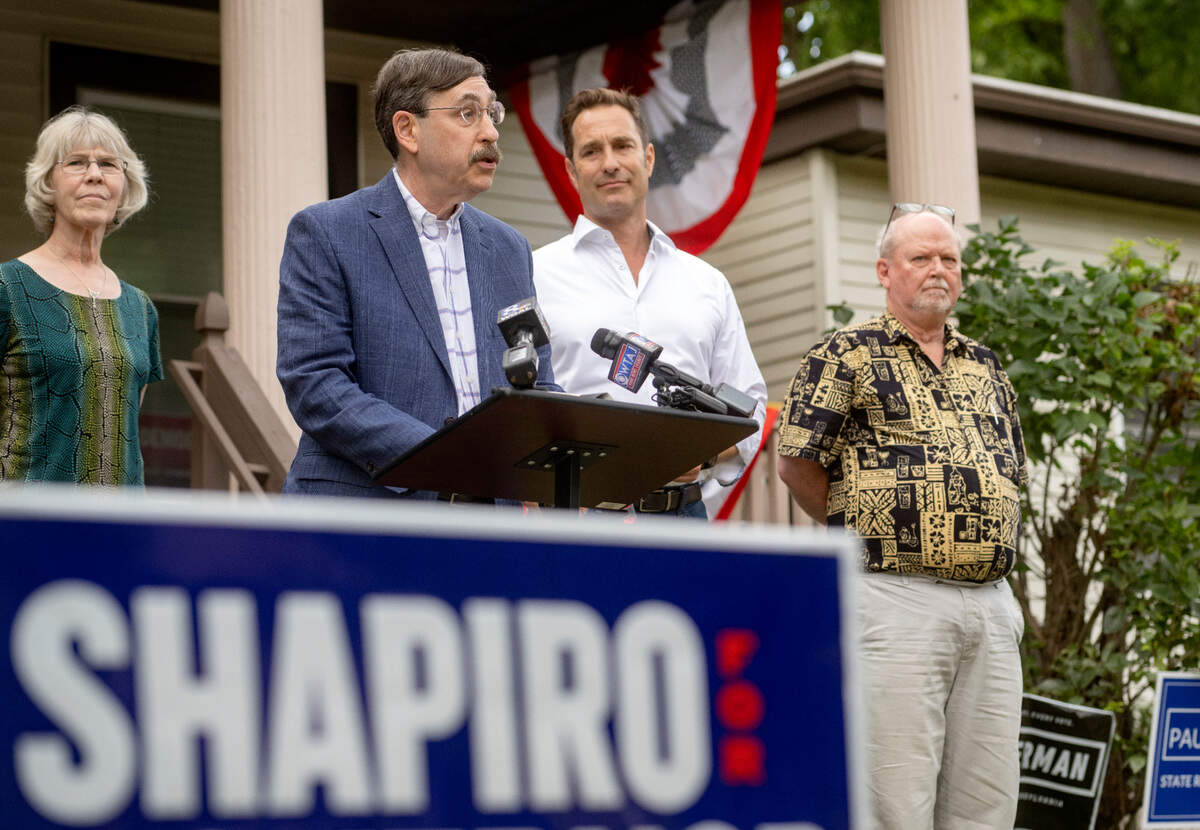 Evan Myers speaks against Doug Mastriano and his association with Gab during a gathering on Tuesday, Aug. 2, 2022.