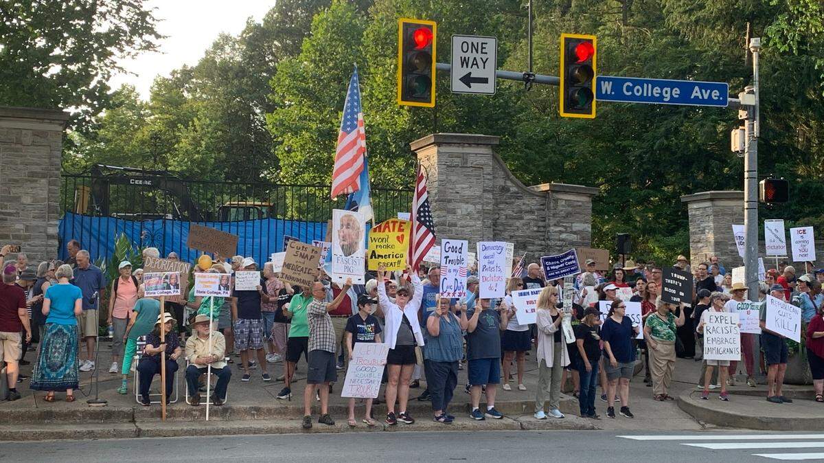More than 100 protesters rallied at the Allen Street gates Thursday, July 17, 2025 to protest President Trump and honor the late U.S. Rep. John Lewis.