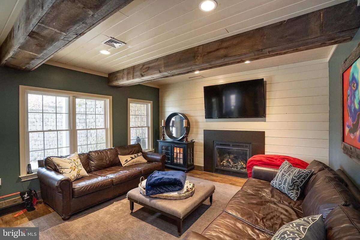 A view of a lower-level living room inside the home at 192 Blackberry Hill in Port Matilda. Photo shared with permission from the home’s listing agent, Jason Krout of Keystone Real Estate Group, LP.