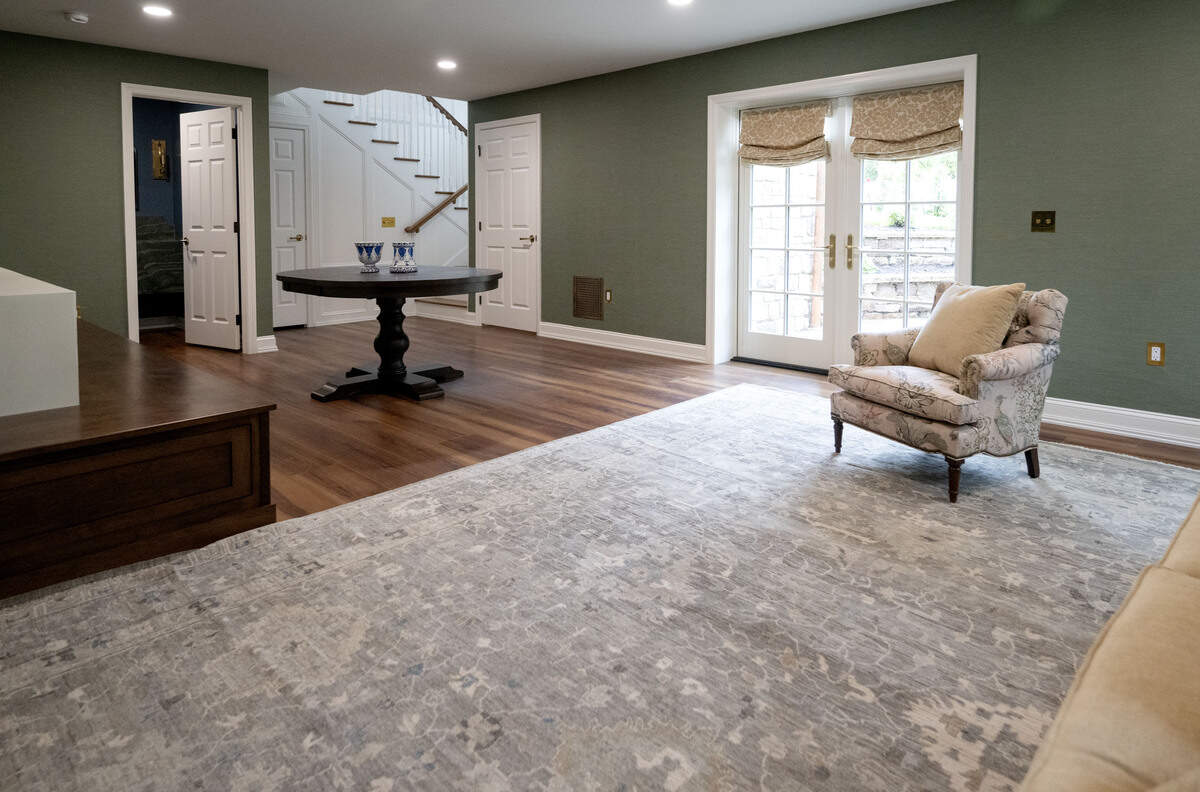A living space that opens to the yard at 619 McKee St. in College Heights Sept. 25, 2025. 