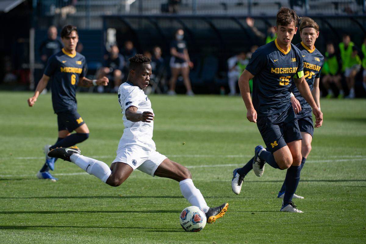 Penn State forward Daniel Bloyou (9) shoots and scores in the 7th minute during the Big Ten Men’s Soccer Tournament Quarterfinal match at the Jeffrey Field on Wednesday, April 14, 2021 in State College, PA. The Nittany Lions defeated Michigan 4-1 to move on to the Big Ten Tournament Final.