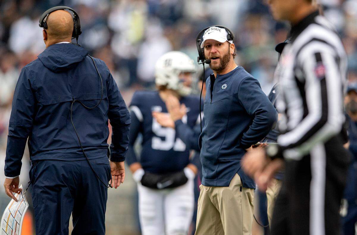 Penn State offensive coordinator Mike Yurcich reacts to a call in the first overtime of the game against Illinois on Saturday, Oct. 23, 2021.