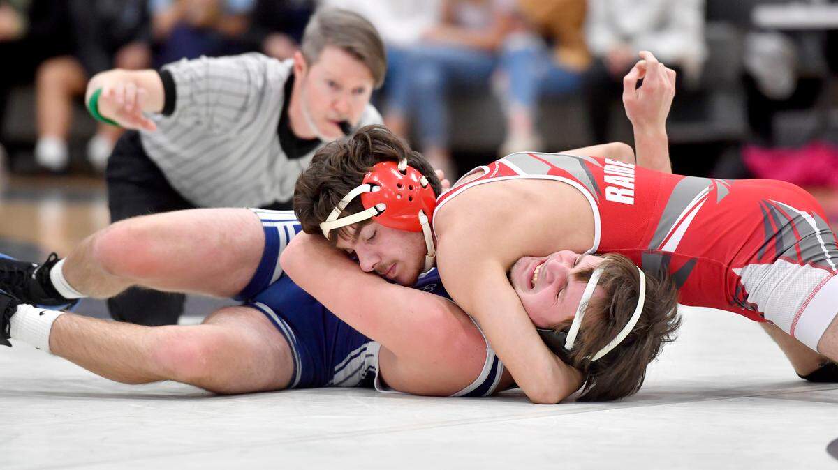 Bellefonte’s Nate Smith pins Penns Valley’s Nick Cain in the 132 lb bout during the match on Tuesday, Jan. 4, 2022.