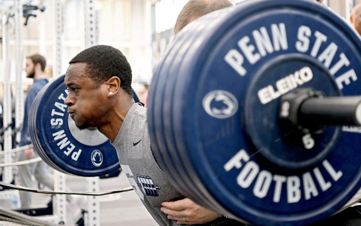 Penn State wide receiver KeAndre Lambert-Smith lifts during a winter workout session on Thursday, Feb. 29, 2024.
