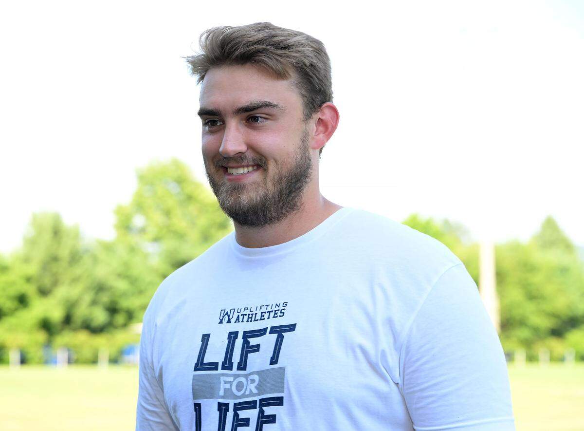 Penn State’s Chris Stoll is interviewed by news media prior to the start of the Nittany Lions annual Lift For Life event at University Park Thursday, June 30, 2022.