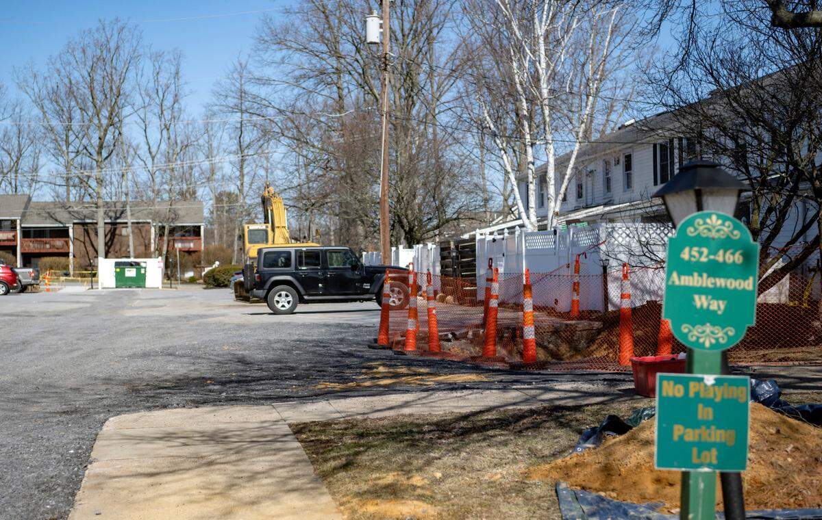 A look at a portion of the sinkhole on Amblewood Way on Monday. The majority of the hole was filled after the water main was repaired. 
