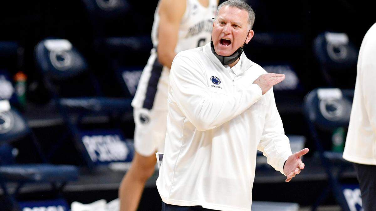 Penn State interim men’s basketball coach Jim Ferry yells to his players as they come off the court at the end of the first off of the game against Rutgers on Thursday, Jan. 21, 2021 at the Bryce Jordan Center.