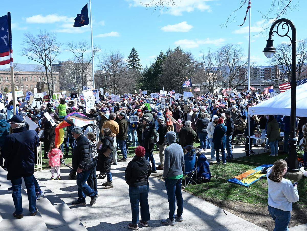Thousands of people carrying signs gathered on Old Main lawn for the No Kings anti-Trump rally on Saturday.  