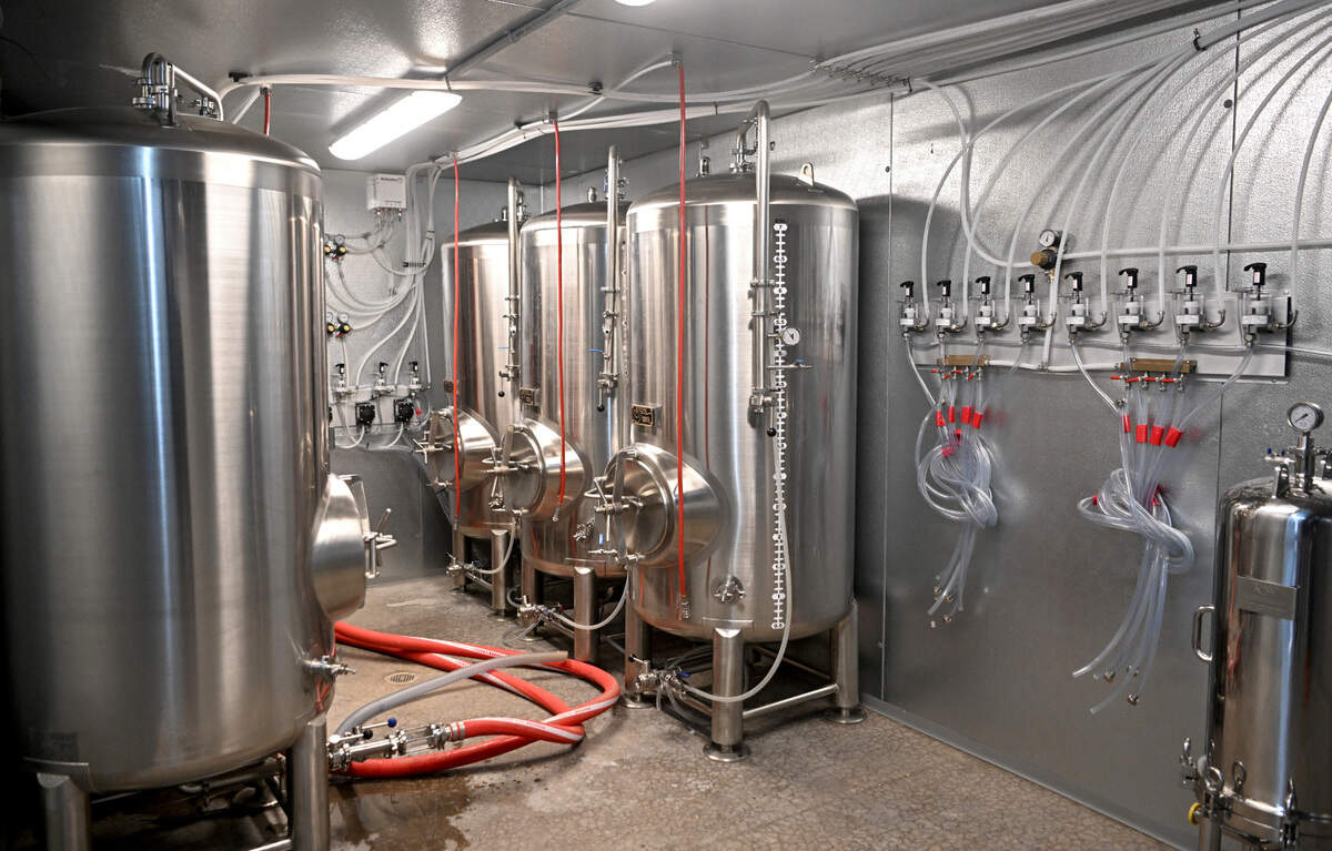 Tanks in the cooler are sanitized to be filled with beer at Boal City Brewing on Friday, March 31, 2023.