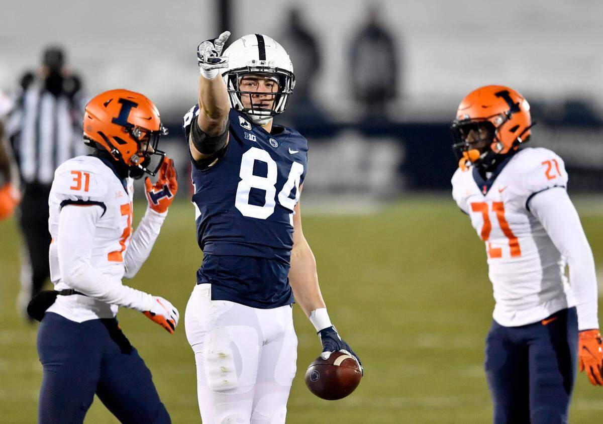 Penn State tight end Theo Johnson motions for a first down after making a play during the game against Illinois on Saturday, Dec. 19, 2020 at Beaver Stadium.