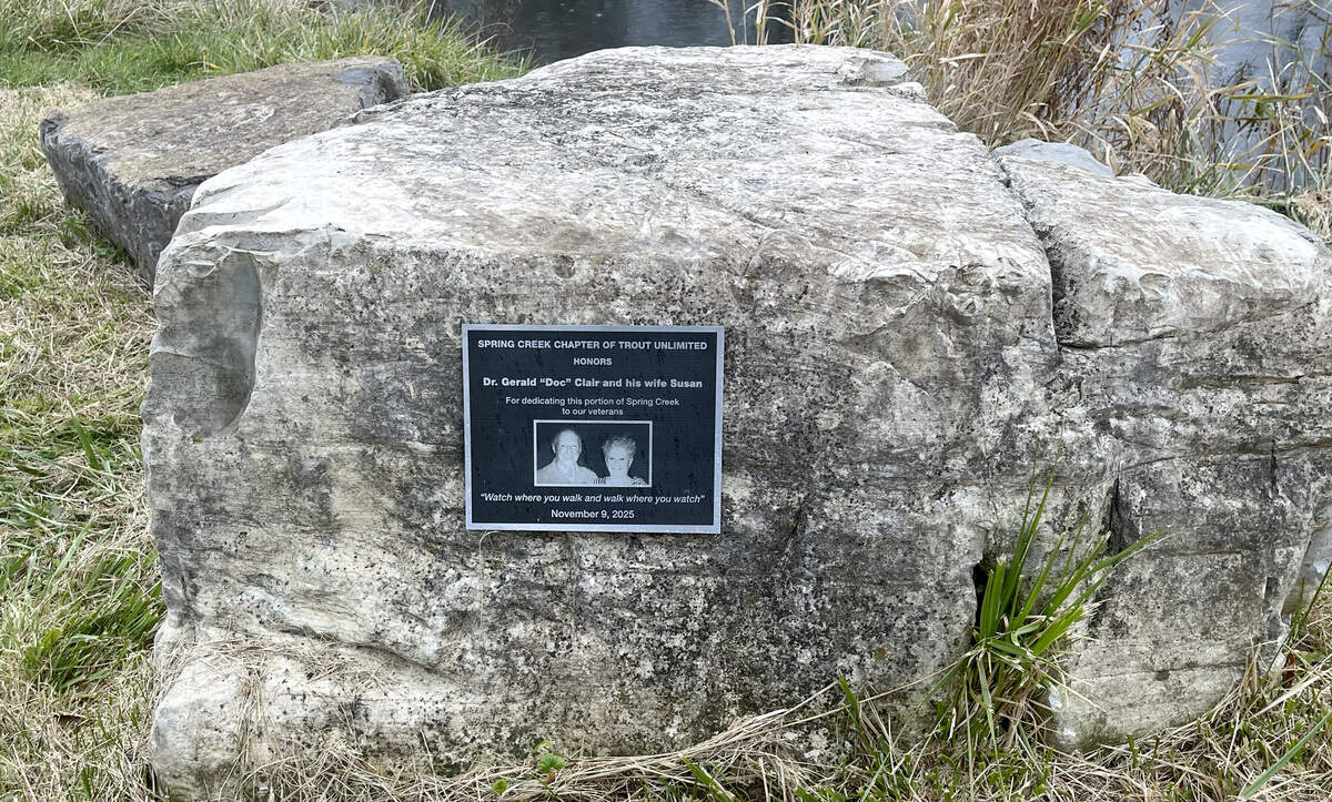A plaque honors Dr. Gerald “Doc” Clair and his wife Susan for dedicating a portion of Spring Creek to veterans.