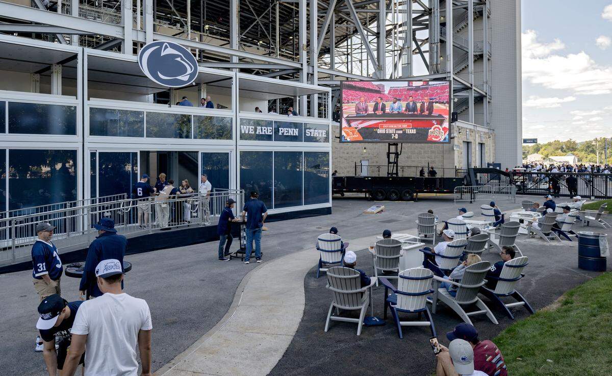Fans enjoy the beer garden at Beaver Stadium on Saturday, Aug. 30, 2025.  